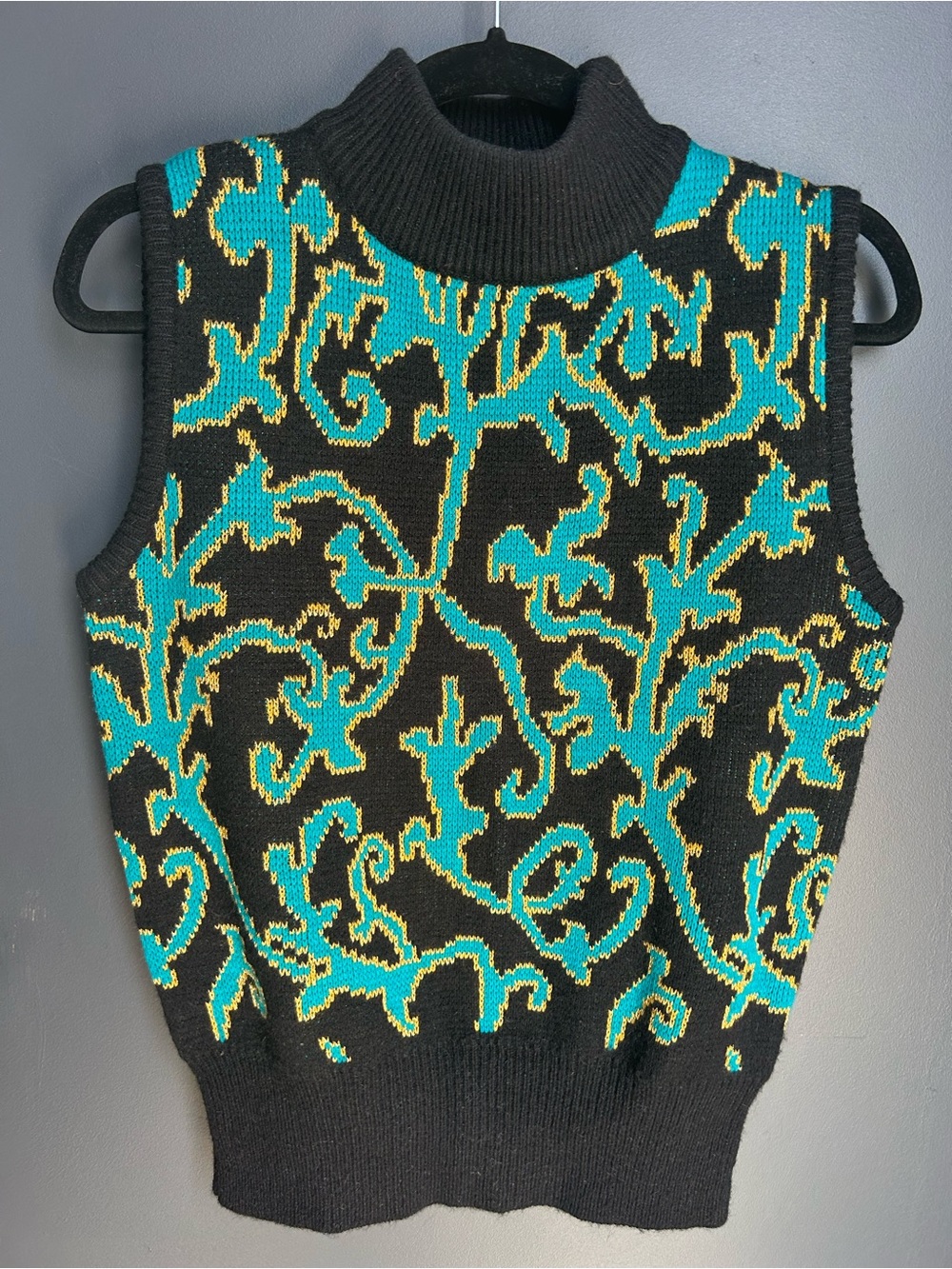 Counterparts Sleeveless Turtleneck Sweater in Black, Teal & Gold